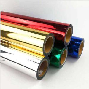 cinco rolos de fita hot stamping em cores sortidas empilhados